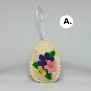 Húsvéti tojás dekoráció vajszín alapon